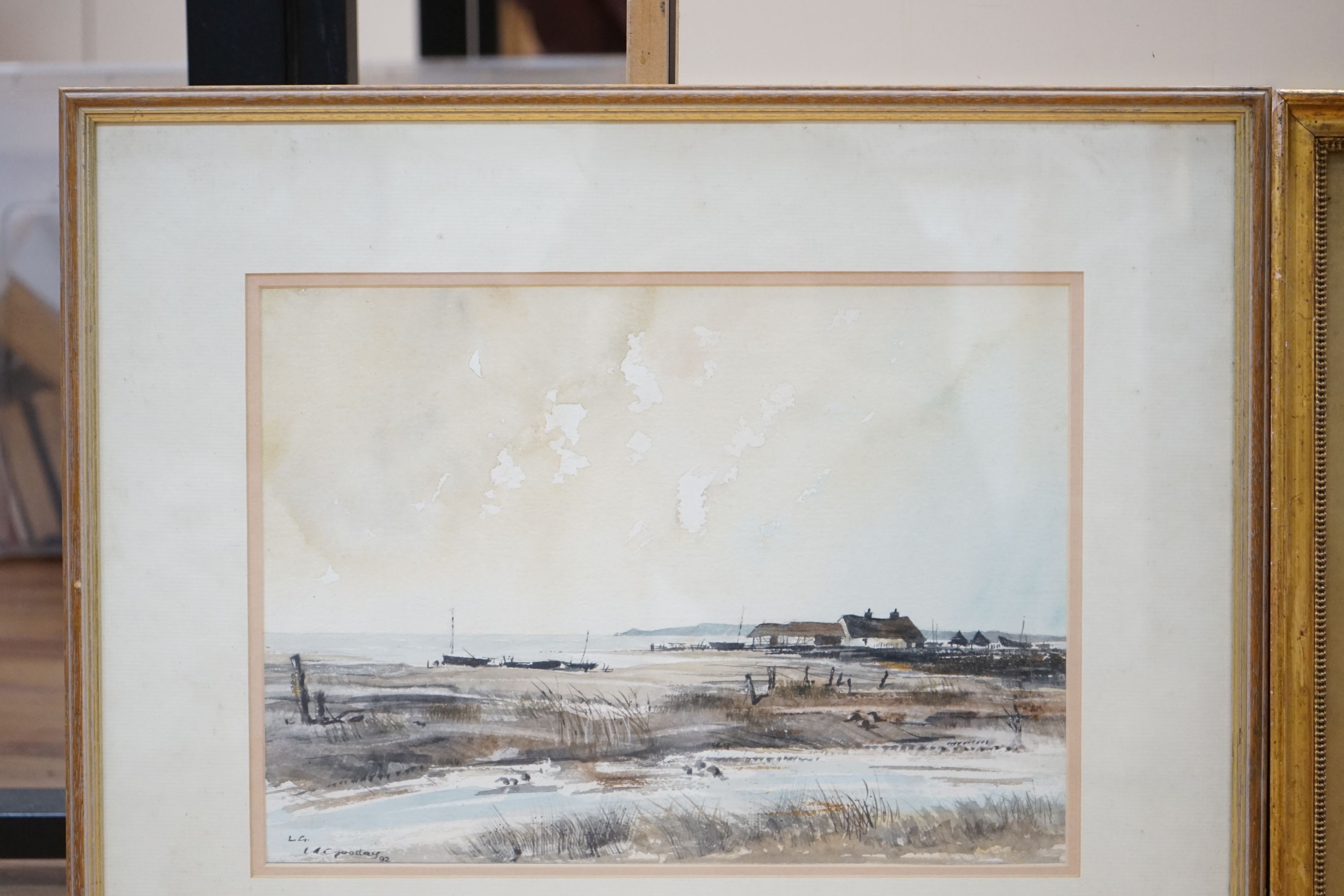 L.J. Poday, watercolour, Coastal landscape with thatched huts, signed and dated '92, 25 x 35cm and a watercolour River lansdcape at sunset, dated 1912, 26 x 36cm